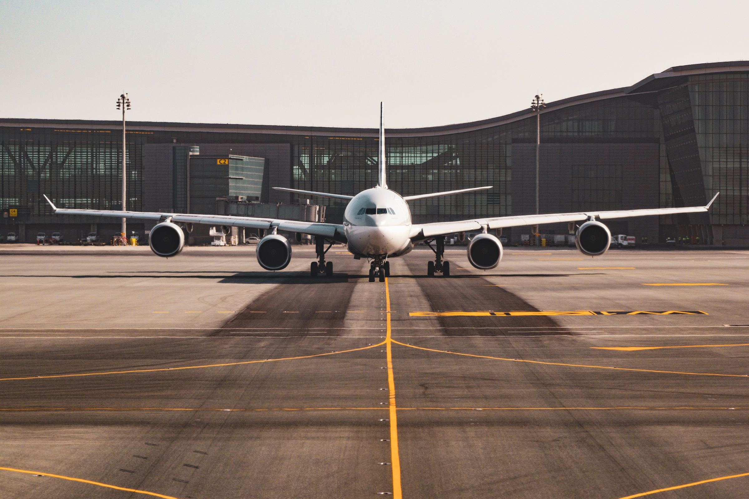 Commercial aircraft on the tarmac facing the camera